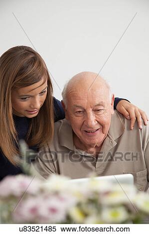 girl having fun with her grandfather View Large Photo Image Stock Photography - girl having fun with her grandfather. Fotosearch