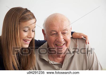girl having fun with her grandfather View Large Photo Image Stock Photography - girl having fun with her grandfather. Fotosearch