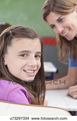 Girl looking at camera View Large Photo Image Picture - Girl looking at camera. Fotosearch
