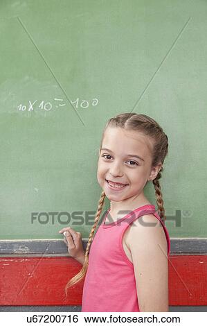 Stock Photograph - Girl looking at camera. Fotosearch