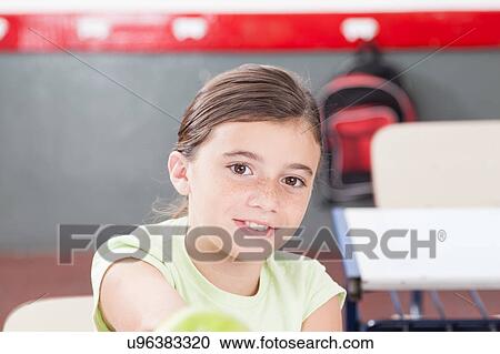 Girl sharing a apple View Large Photo Image Stock Image - Girl sharing a apple. Fotosearch