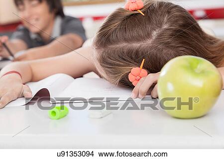 girl sleeping in class View Large Photo Image Picture - girl sleeping in class. Fotosearch