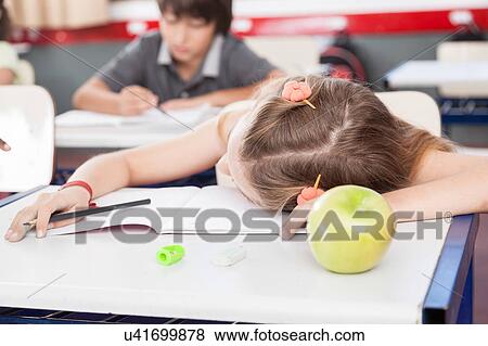 girl sleeping in class View Large Photo Image Stock Photo - girl sleeping in class. Fotosearch