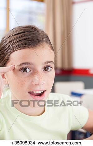 Picture - girl thinking. Fotosearch