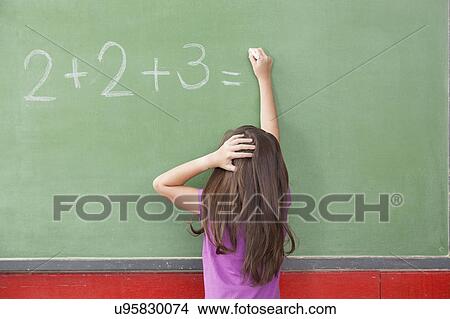 Girl trying do an excercise of math View Large Photo Image Picture - Girl trying do an excercise of math. Fotosearch