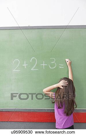 Girl trying do an excercise of math View Large Photo Image Stock Image - Girl trying do an excercise of math. Fotosearch