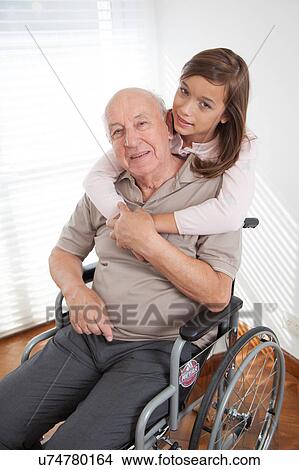 Picture - girl with her grandfather . Fotosearch