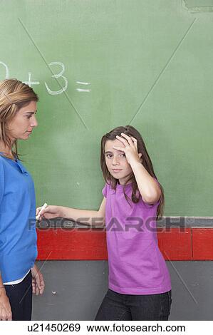 Girl worried about math View Large Photo Image Stock Photo - Girl worried about math. Fotosearch
