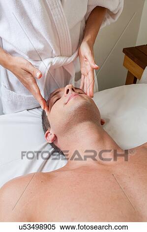 Stock Photography - Guy receiving massage. Fotosearch