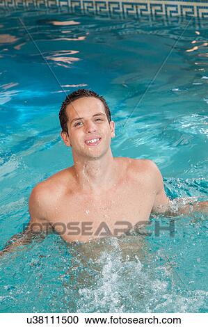 Guy splashing water View Large Photo Image Stock Image - Guy splashing water. Fotosearch