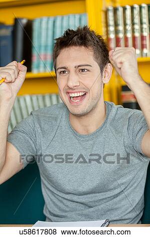 Stock Photo - Guy with his fist up. Fotosearch