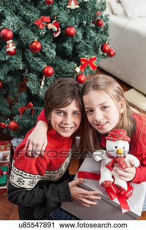 Happy brothers in christmas View Large Photo Image Stock Image - Happy brothers in christmas. Fotosearch