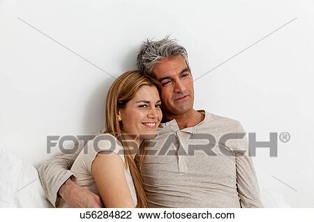 Happy couple hugging View Large Photo Image Stock Image - Happy couple hugging. Fotosearch