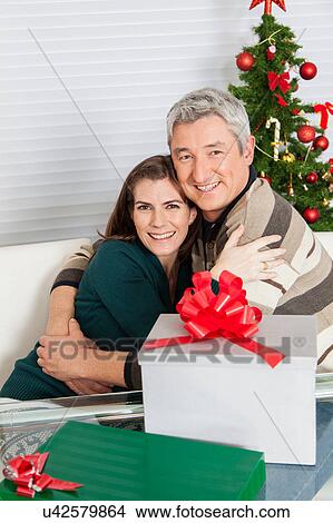 Happy couple in christmas View Large Photo Image Picture - Happy couple in christmas. Fotosearch