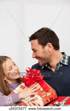 Happy father with his daugther View Large Photo Image Stock Photo - Happy father with his daugther. Fotosearch