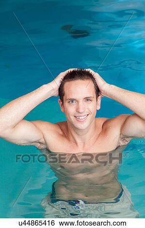 Stock Photograph - Happy man swimming. Fotosearch