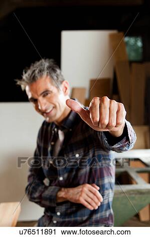 Happy man with his thumb up View Large Photo Image Stock Image - Happy man with his thumb up. Fotosearch