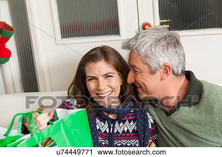 Happy parents in christmas View Large Photo Image Stock Image - Happy parents in christmas. Fotosearch