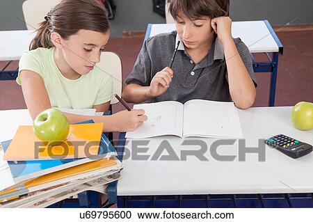 Stock Image - kids in the classroom. Fotosearch
