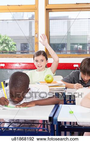Stock Image - kids in the classroom. Fotosearch