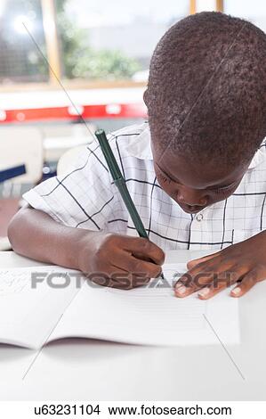 little boy studying View Large Photo Image Picture - little boy studying. Fotosearch