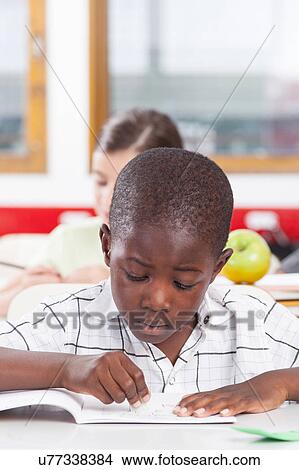 little boy studying View Large Photo Image Picture - little boy studying. Fotosearch