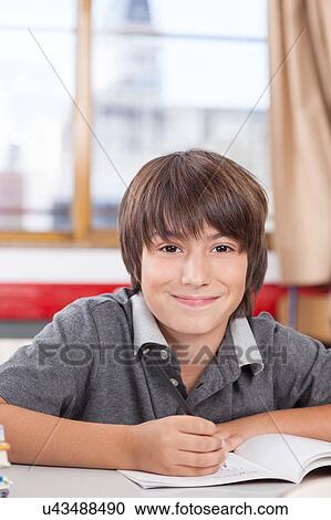 little boy studying View Large Photo Image Stock Image - little boy studying. Fotosearch