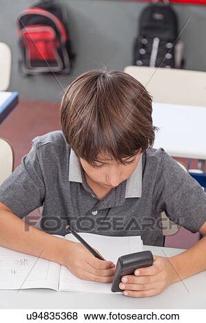 little boy studying View Large Photo Image Stock Photo - little boy studying. Fotosearch