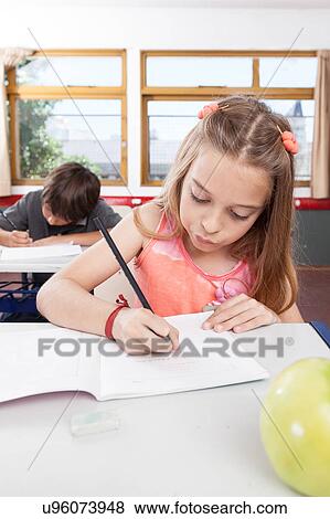 Little girl studying View Large Photo Image Stock Photo - Little girl studying. Fotosearch