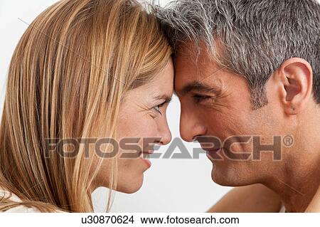 Picture - Lovely couple looking at each other. Fotosearch