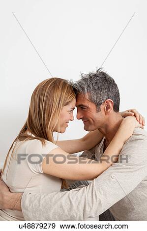 Stock Photo - Lovely couple looking at each other. Fotosearch