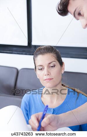 Male nurse helping a woman View Large Photo Image Stock Image - Male nurse helping a woman. Fotosearch