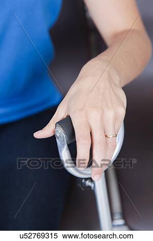 Stock Photography - Male nurse helping a woman. Fotosearch