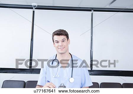 male nurse working View Large Photo Image Stock Image - male nurse working . Fotosearch