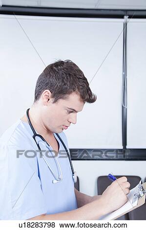 male nurse working View Large Photo Image Stock Photo - male nurse working . Fotosearch