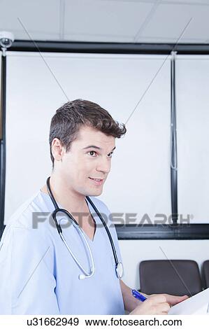 male nurse working View Large Photo Image Stock Photo - male nurse working . Fotosearch