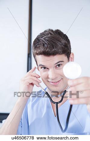 male nurse working View Large Photo Image Stock Photo - male nurse working . Fotosearch