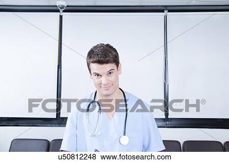 Stock Photo - male nurse working . Fotosearch