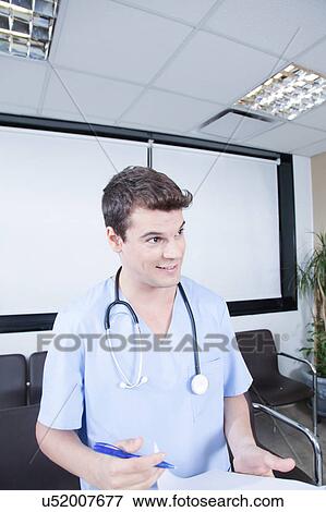 male nurse working View Large Photo Image Stock Photo - male nurse working . Fotosearch