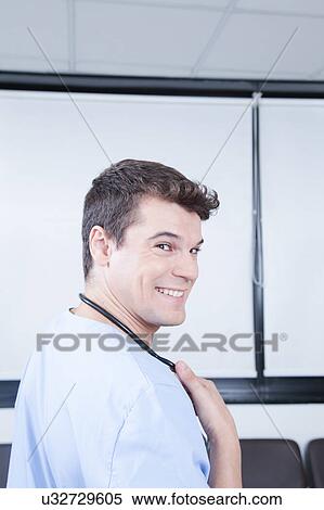 Stock Photography - male nurse working . Fotosearch