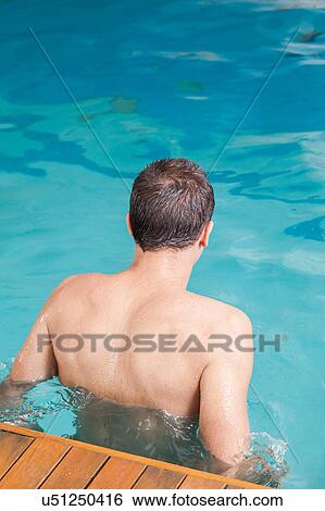 Man back swimming View Large Photo Image Stock Photograph - Man back swimming. Fotosearch