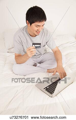 Man buying by network View Large Photo Image Stock Image - Man buying by network. Fotosearch