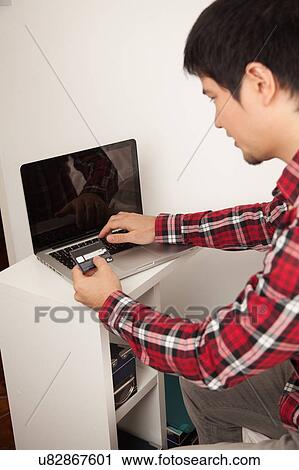 Man buying by network View Large Photo Image Stock Image - Man buying by network. Fotosearch