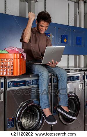 Stock Image - Man celebrating. Fotosearch