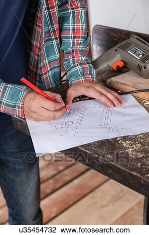 Man drawing a plane View Large Photo Image Stock Image - Man drawing a plane. Fotosearch