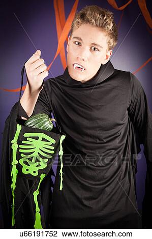 Stock Image - Man dressed for halloween. Fotosearch