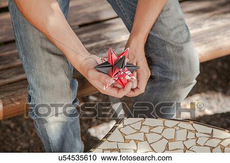 Man holging a gift View Large Photo Image Stock Image - Man holging a gift. Fotosearch
