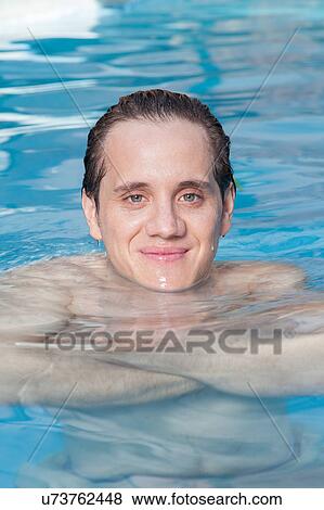 Man in the pool View Large Photo Image Stock Photo - Man in the pool. Fotosearch