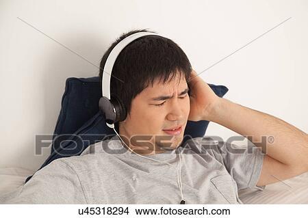 Man listening to music View Large Photo Image Picture - Man listening to music. Fotosearch