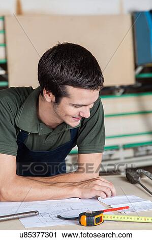 Man looking a plane View Large Photo Image Stock Image - Man looking a plane. Fotosearch